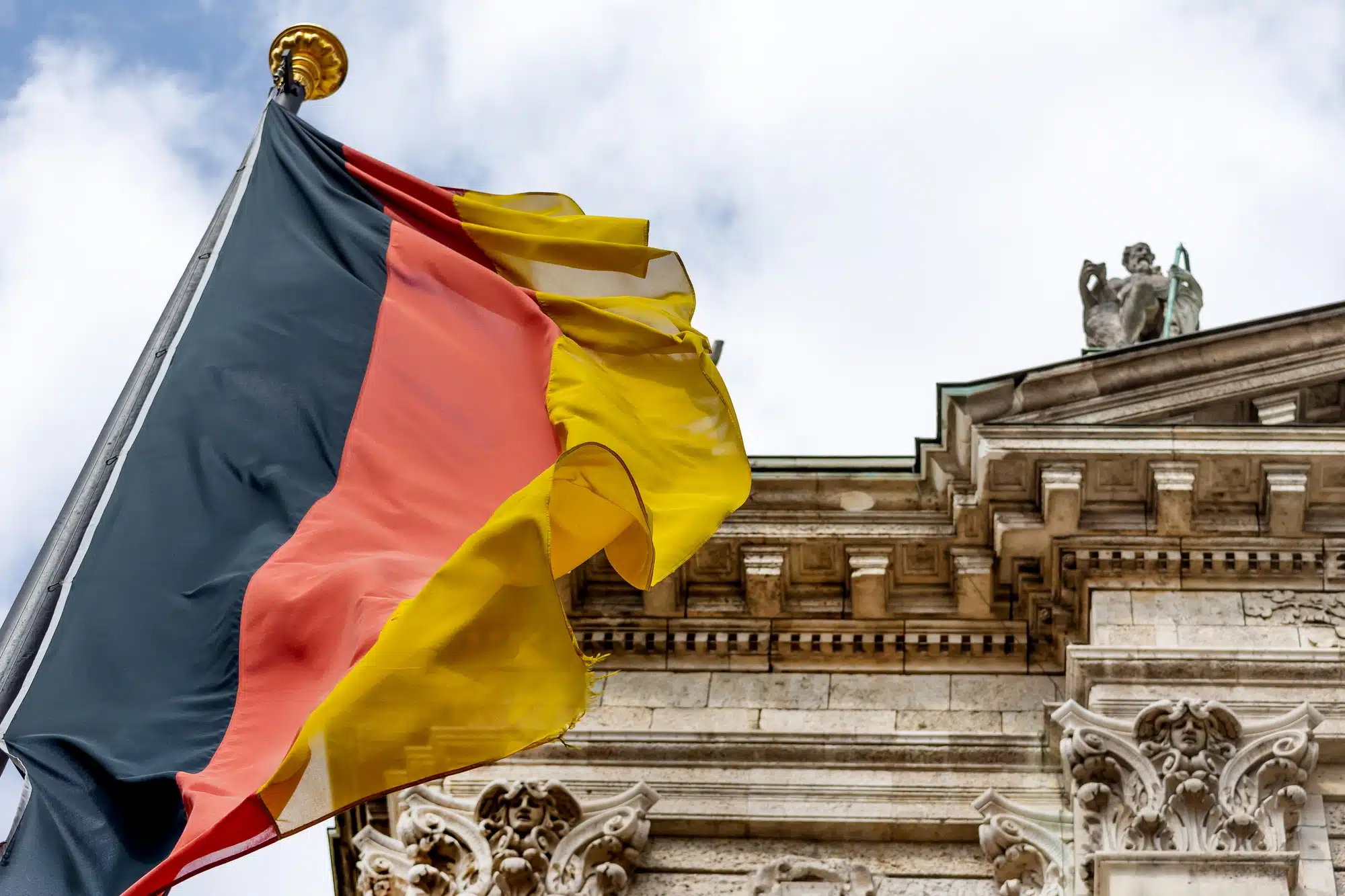 German flag waving in front of the building in Munich, Germany